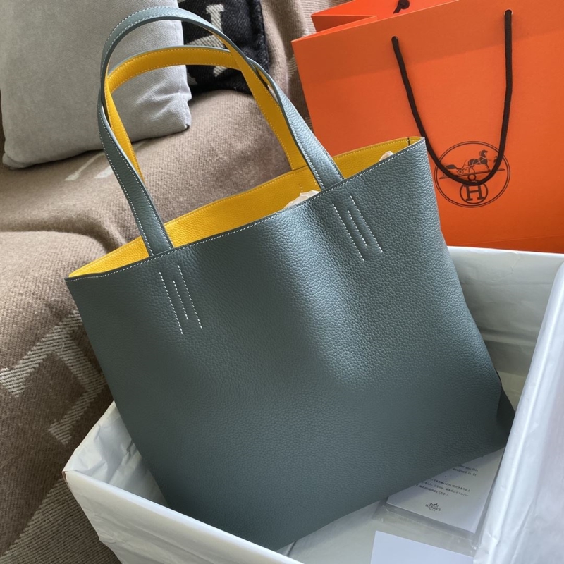H**mes shopping bags